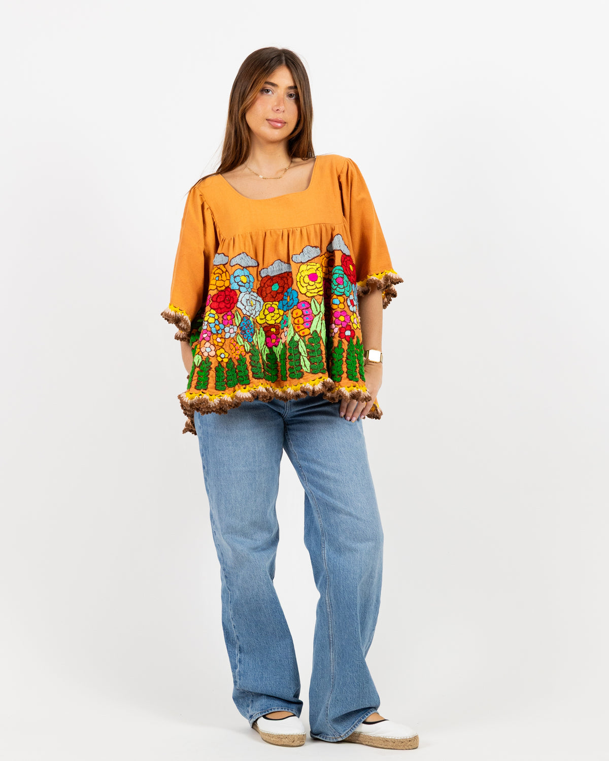 Orange short sleeve with hand stitched print