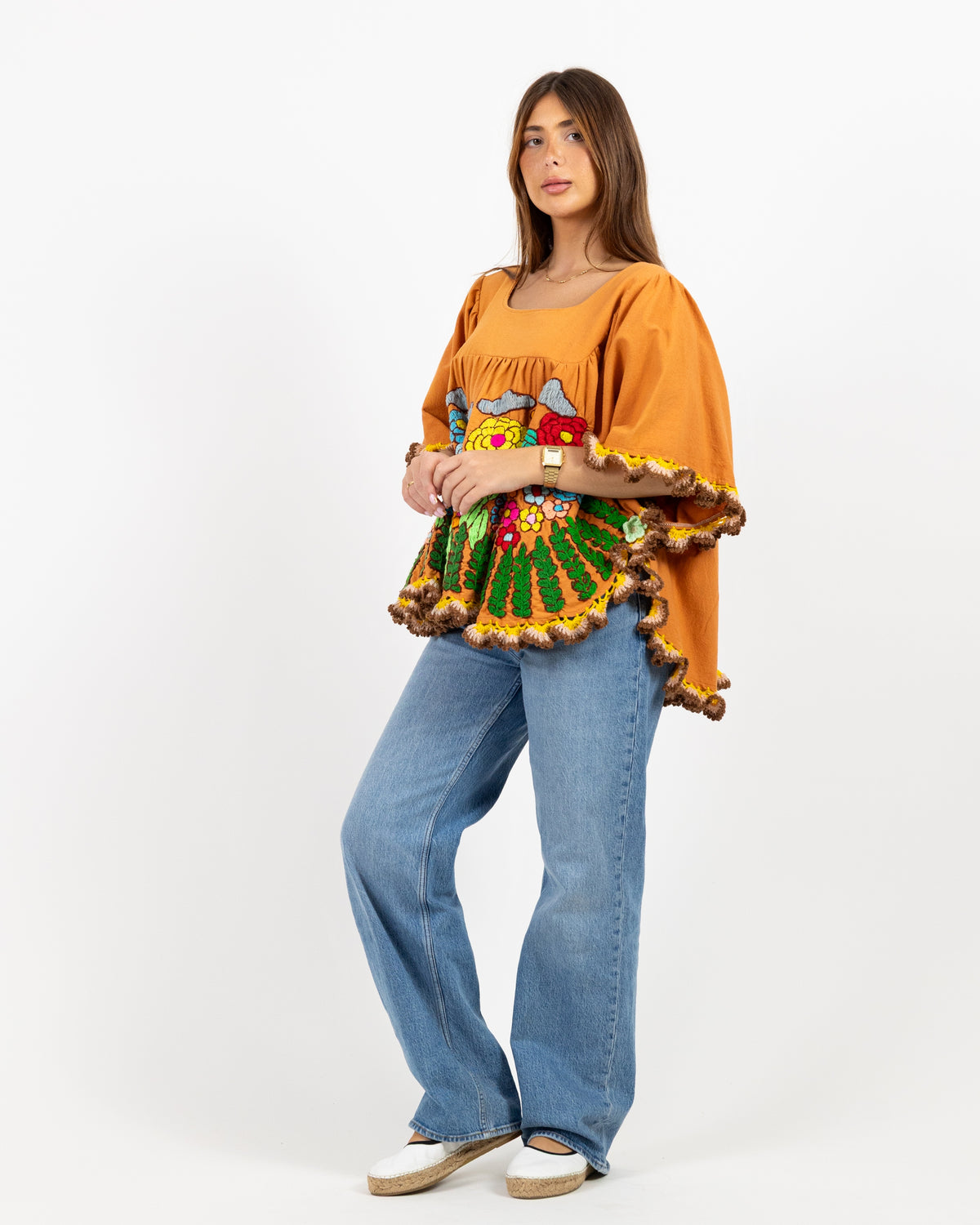 Orange short sleeve with hand stitched print