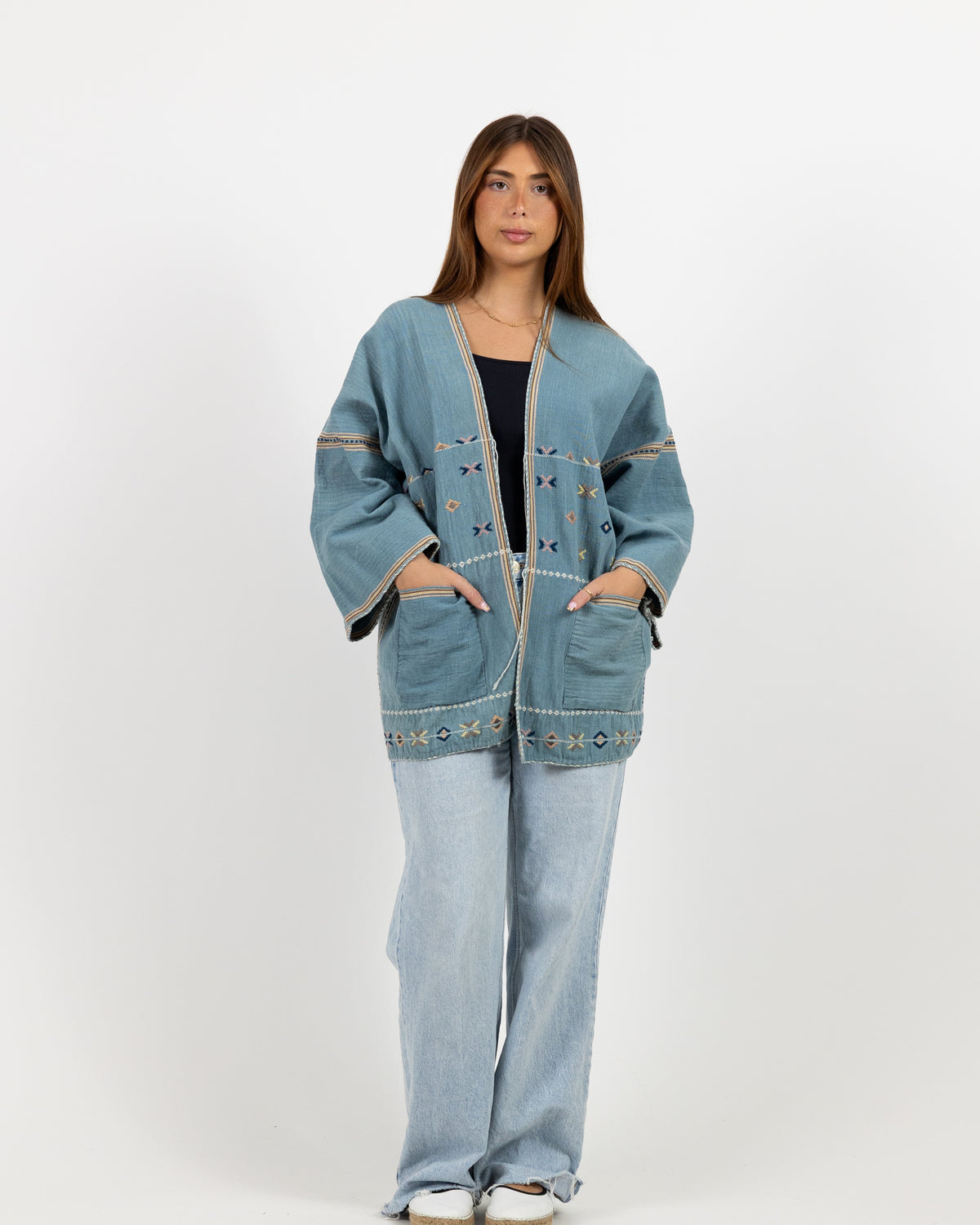 Long sleeve blue jacket with beige pattern