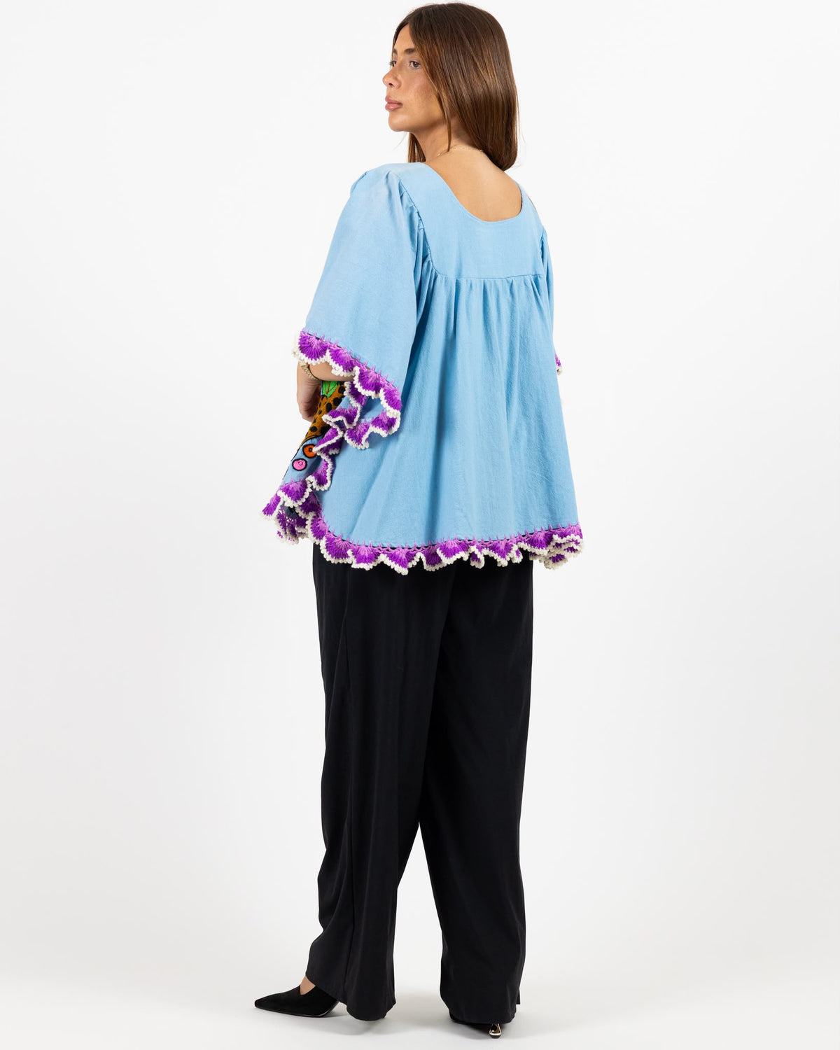 Blue short sleeve cotton top with hand stitched animal print